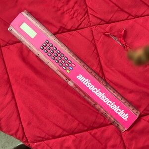Anti social social club ruler/calculator